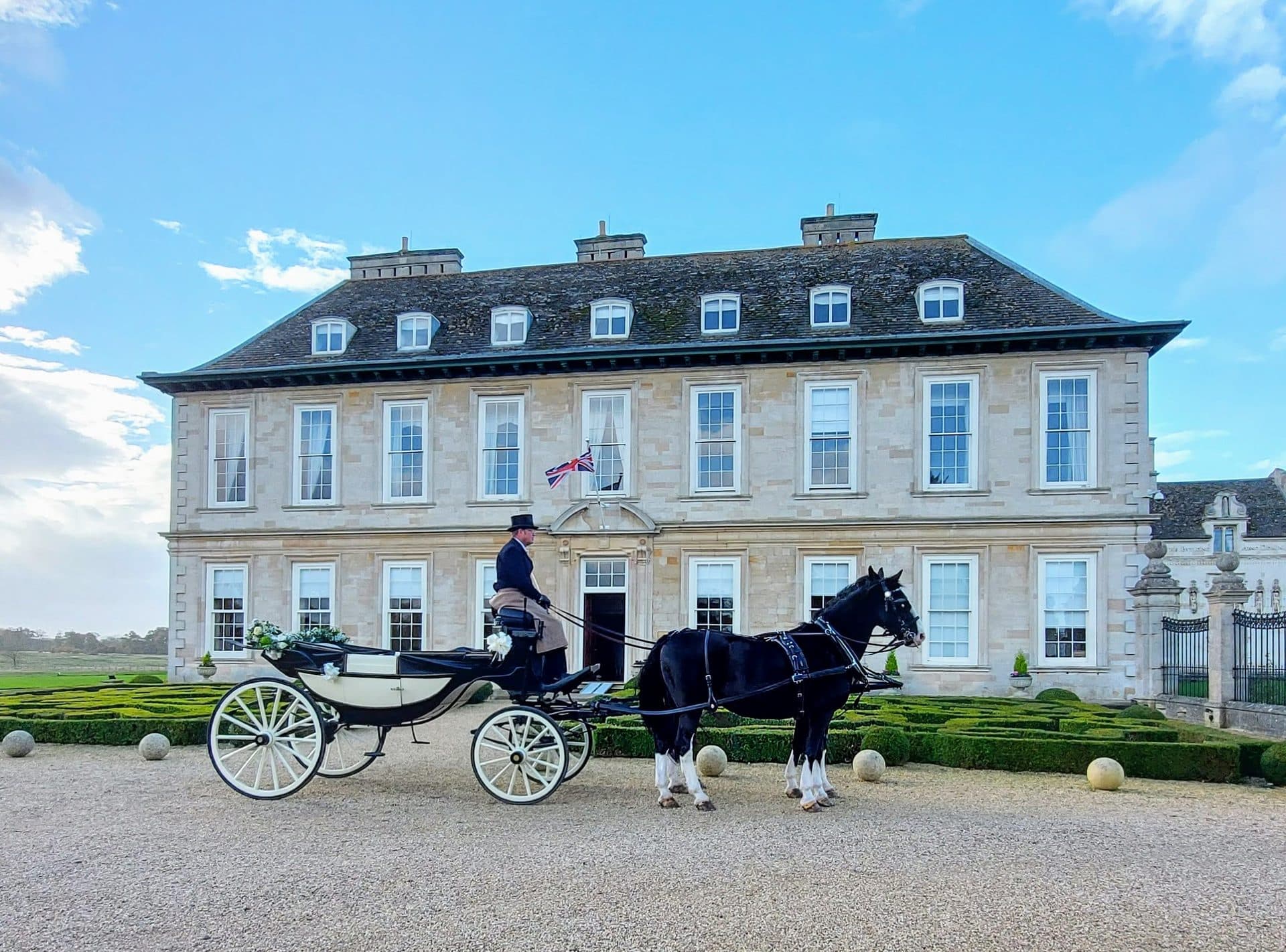 DK Carriage Horses on a film and television shoot, coachman on the box seat